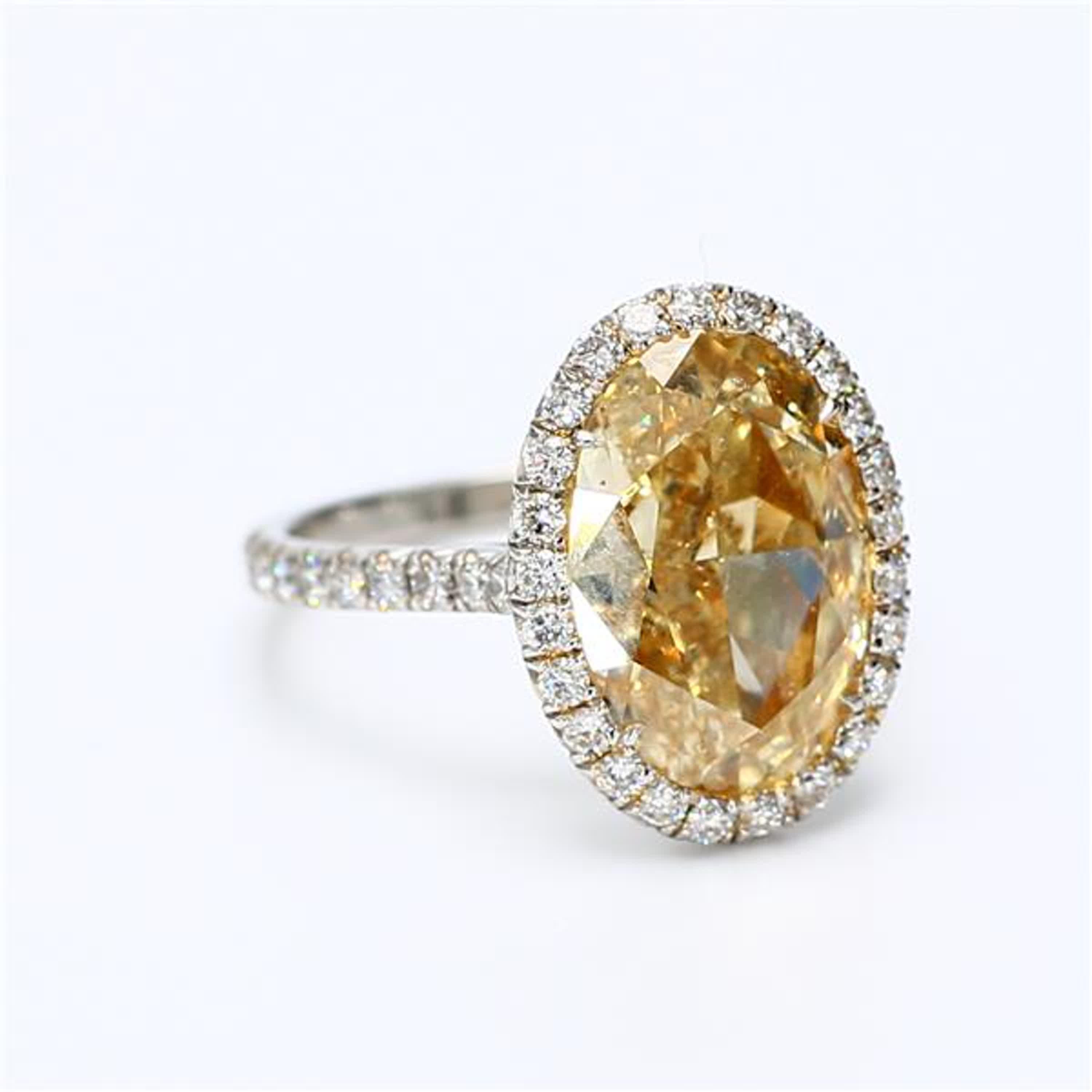 GIA-zertifizierter natürlicher gelber ovaler und weißer Diamant 5.68 Karat TW Platinring 1