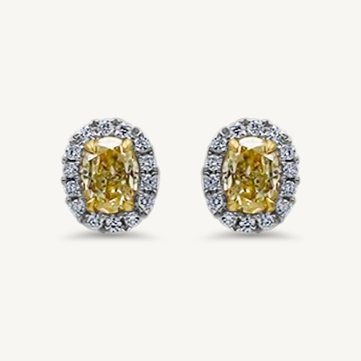 GIA Certified Natural Yellow Oval Diamond 1.02 Carat TW Gold Stud Earrings