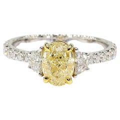 Anello da cocktail in oro con diamante ovale giallo naturale certificato GIA da 2.15 carati TW
