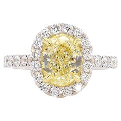 Anello da cocktail in oro con diamante ovale giallo naturale certificato GIA da 2.66 carati TW
