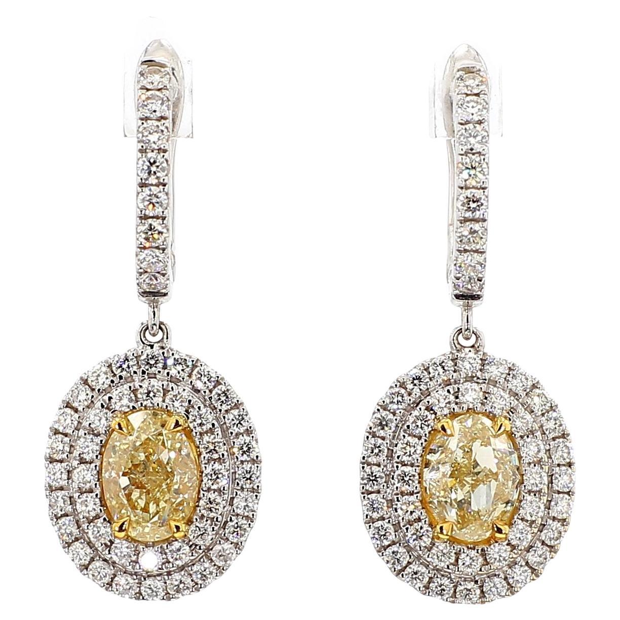 Orecchini a goccia in oro con diamanti ovali gialli certificati GIA da 2.87 carati TW