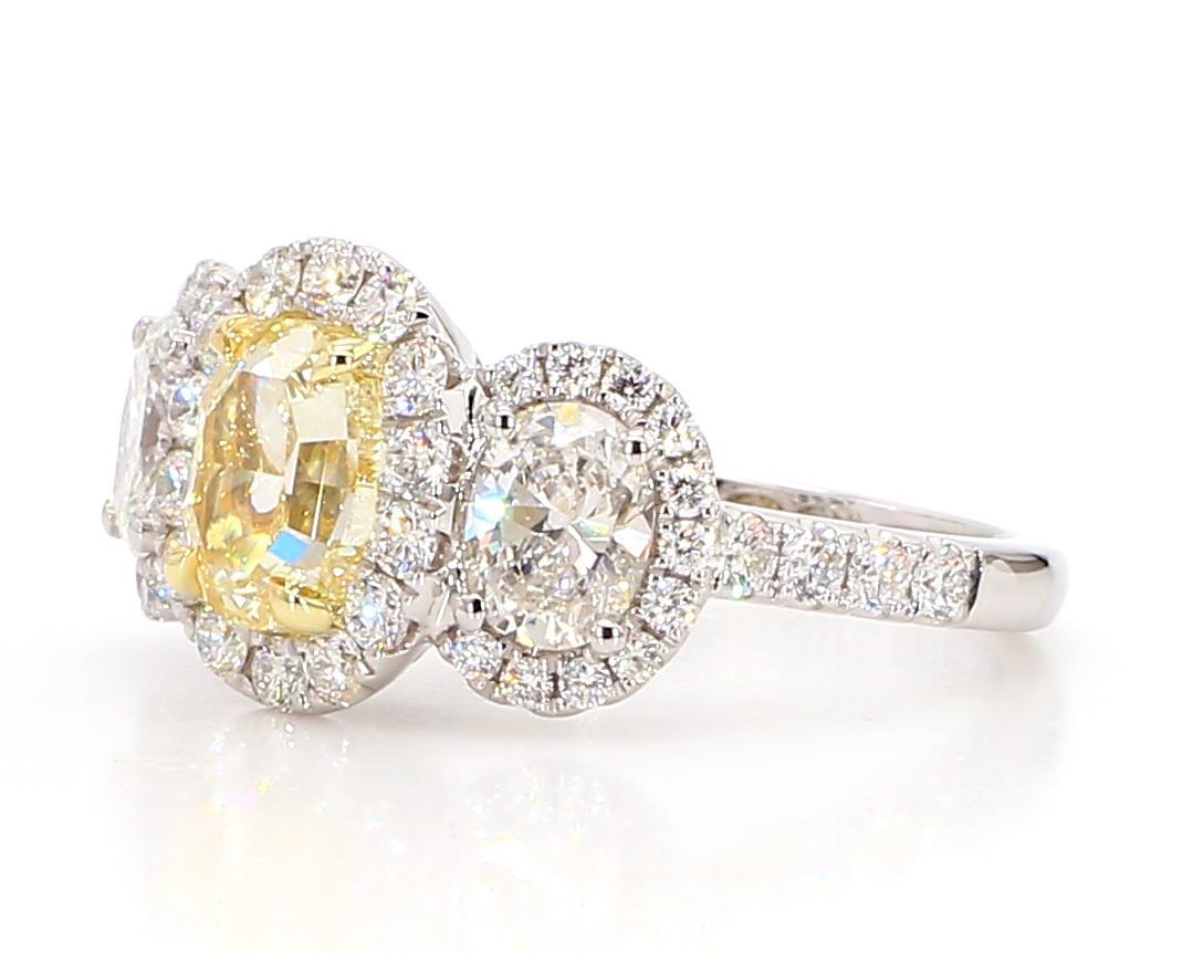 Contemporary GIA Certified Natural Yellow Oval Diamond 3.20 Carat TW Plat Cocktail Ring For Sale
