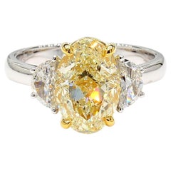 GIA Certified Natural Yellow Oval Diamond 4.04 Carat TW Gold Cocktail Ring