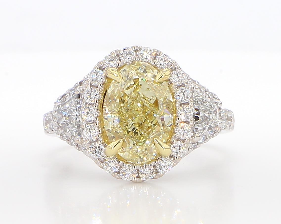 Contemporary GIA Certified Natural Yellow Oval Diamond 4.06 Carat TW Gold Cocktail Ring For Sale