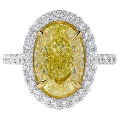 GIA Certified Natural Yellow Oval Diamond 5.78 Carat TW Gold Cocktail Ring
