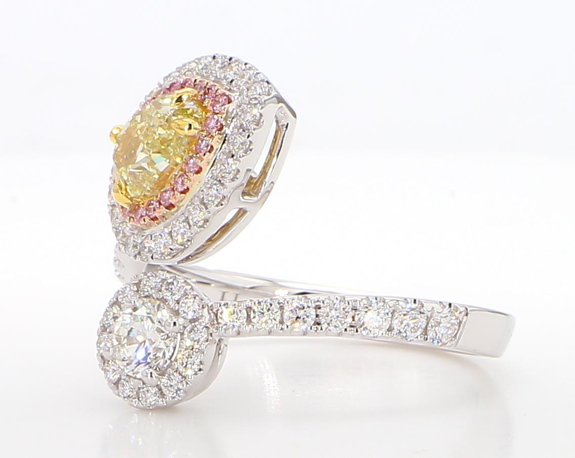 RareGemWorld's beautiful GIA certified diamond ring. Mounted in a beautiful 18K Rose and White setting with a natural pear cut greenish yellow diamond. The diamond is surrounded by round cut natural white diamond melee and round natural pink diamond