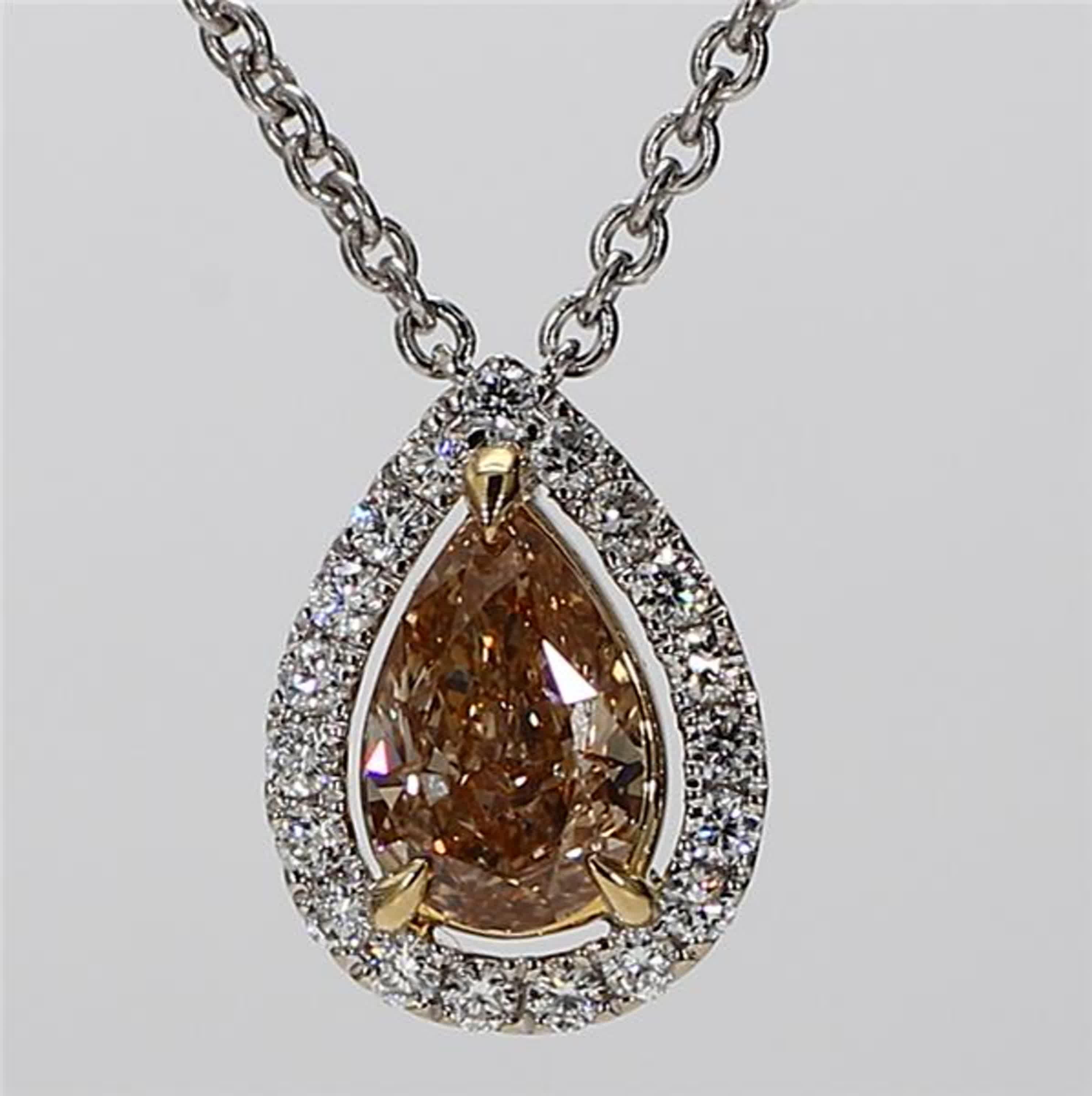 RareGemWorld's classic GIA certified diamond necklace. Mounted in a beautiful 18K Yellow and White Gold setting with a natural pear cut yellow diamond. The yellow diamond is surrounded by small round natural white diamond melee. This necklace is