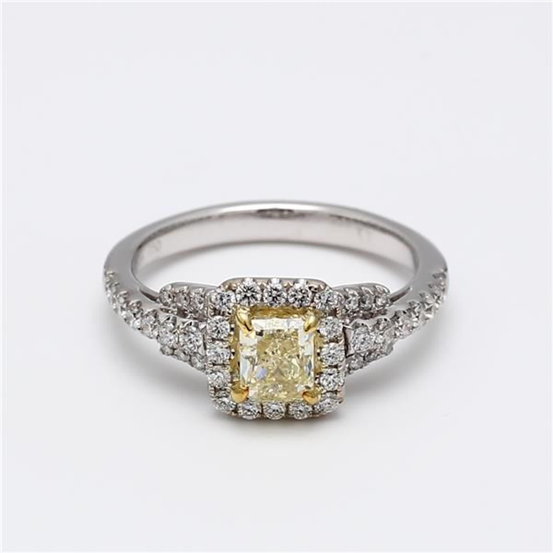 RareGemWorld's classic GIA certified diamond ring. Mounted in a beautiful 18K Yellow and White Gold setting with a natural radiant cut yellow diamond. The yellow diamond is surrounded by round natural white diamond melee. This ring is guaranteed to