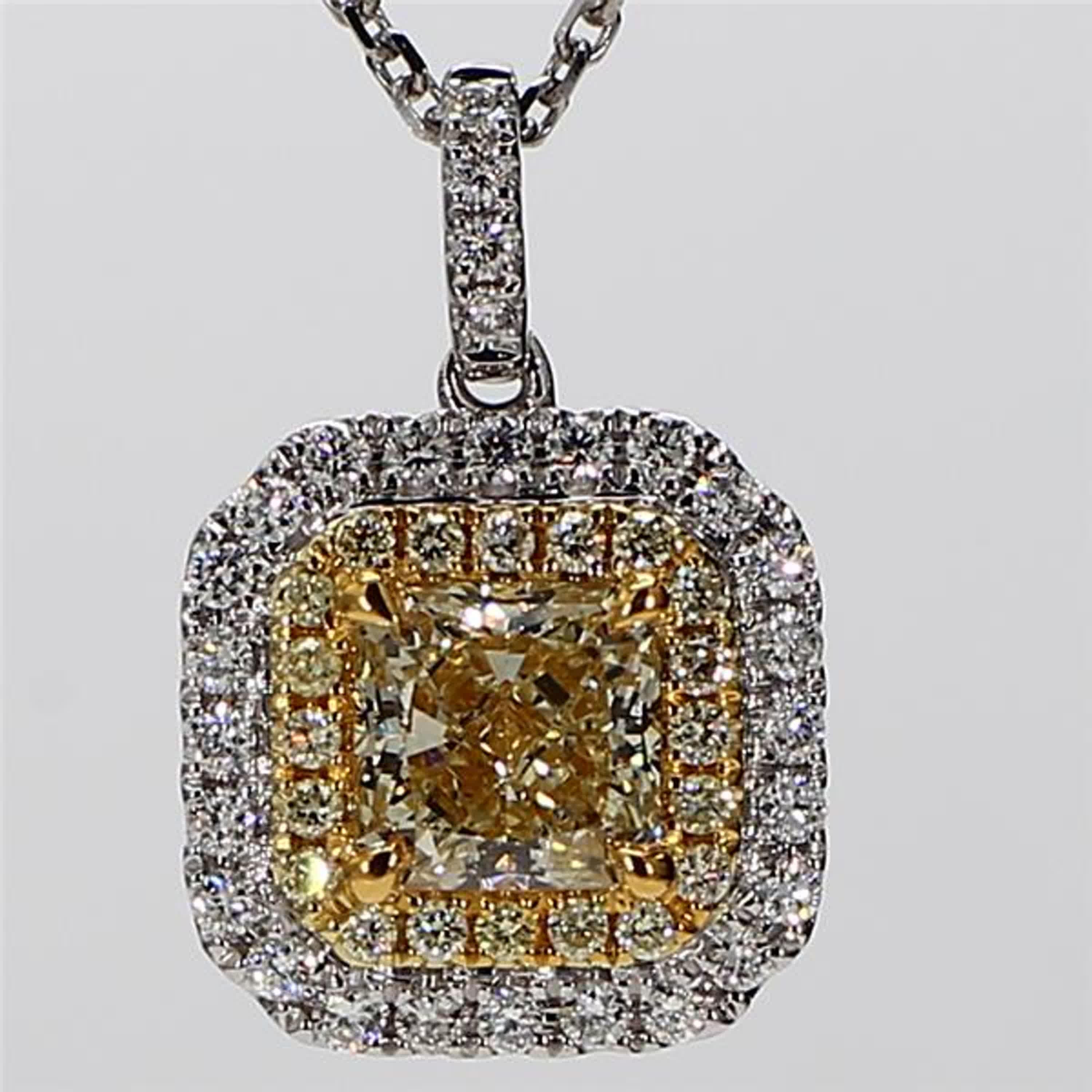 RareGemWorld's classic GIA certified diamond pendant. Mounted in a beautiful 18K Yellow and White Gold setting with natural radiant cut yellow diamonds. The yellow diamonds are surrounded by round natural yellow diamond melee and round natural white