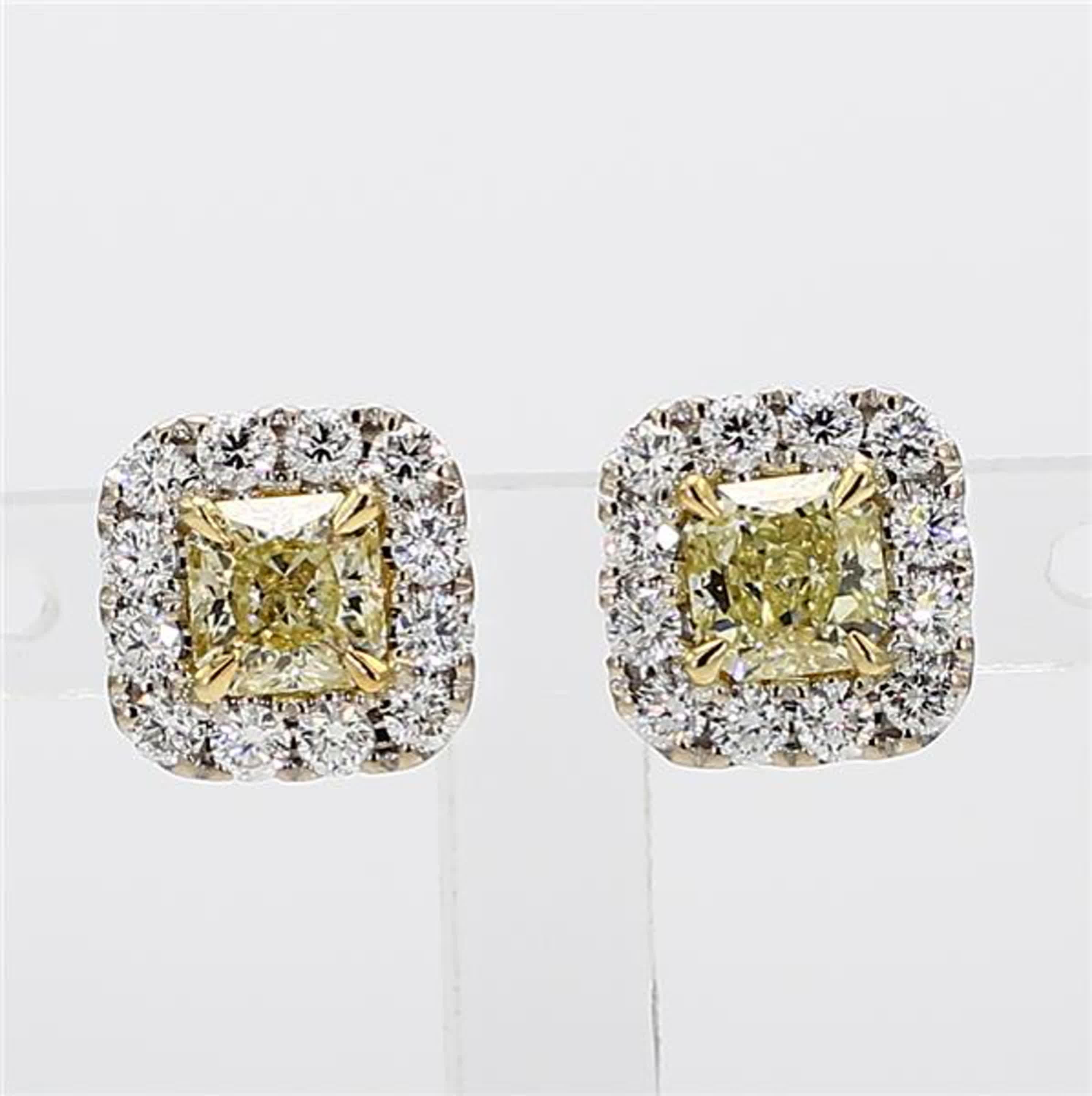 RareGemWorld's classic GIA certified diamond earrings. Mounted in a beautiful 18K Yellow and White Gold setting with natural radiant cut yellow diamonds. The yellow diamonds are surrounded by round natural white diamond melee. These earrings are