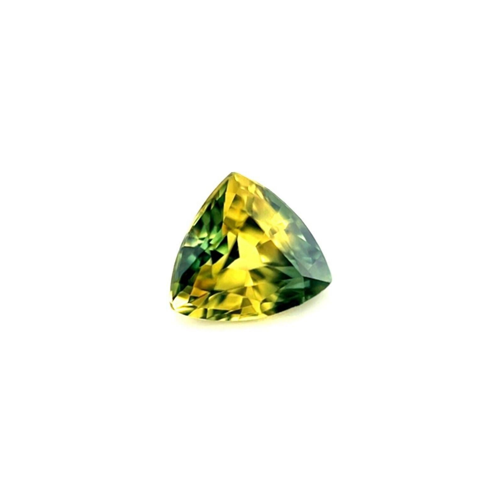 Certificado GIA Sin Calor 0,81ct Zafiro Bicolor Azul Amarillo Triángulo 5,3x5,9mm

Zafiro triangular amarillo azul bicolor natural sin tratar certificado por el GIA.
Zafiro sin calentar de 0,81 quilates con un bello efecto bicolor amarillo azulado
