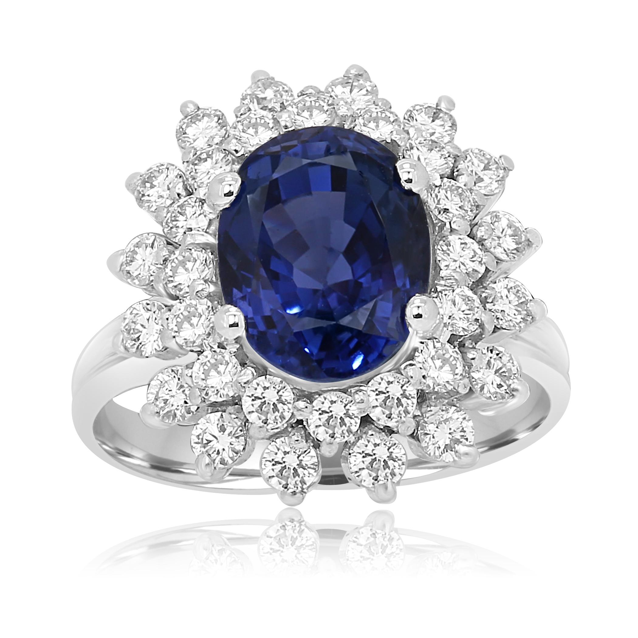Stunning GIA Certified No Heat 6.19 Carat Ceylon Sapphire Encircled in a Double Halo of White Round Diamonds 1.20 Carat Handset in 18K White Gold Classic Ring.

MADE IN USA
Center Sapphire Weight 6.19 Carat
Total  Weight 7.39 Carat