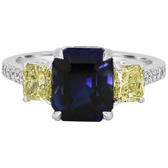 GIA Certified No Heat Blue Sapphire 4.94 Carat Diamond Three-Stone Gold Ring