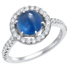 Vintage GIA Certified No Heat Cabochon Sapphire 1.65 Carat Halo Diamond 0.40 Carat Ring 