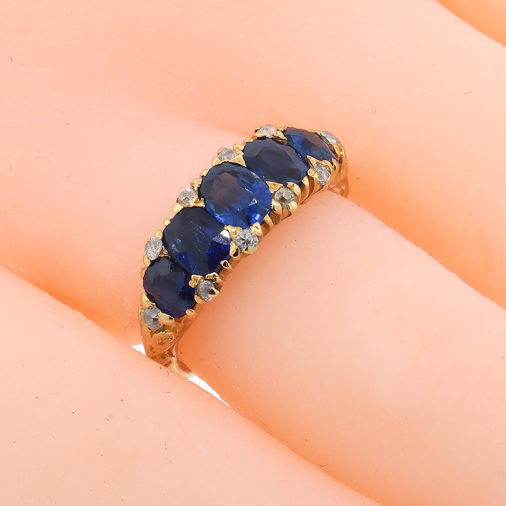 The traditional look of this lovely ring ensures it will be a hit with anyone who loves vintage-style jewelry and would make a wonderful gift.

Very Rich Color Sapphires accented with diamonds.

18k Yellow Gold
Ring Size: 6
Total Weight: 5.0