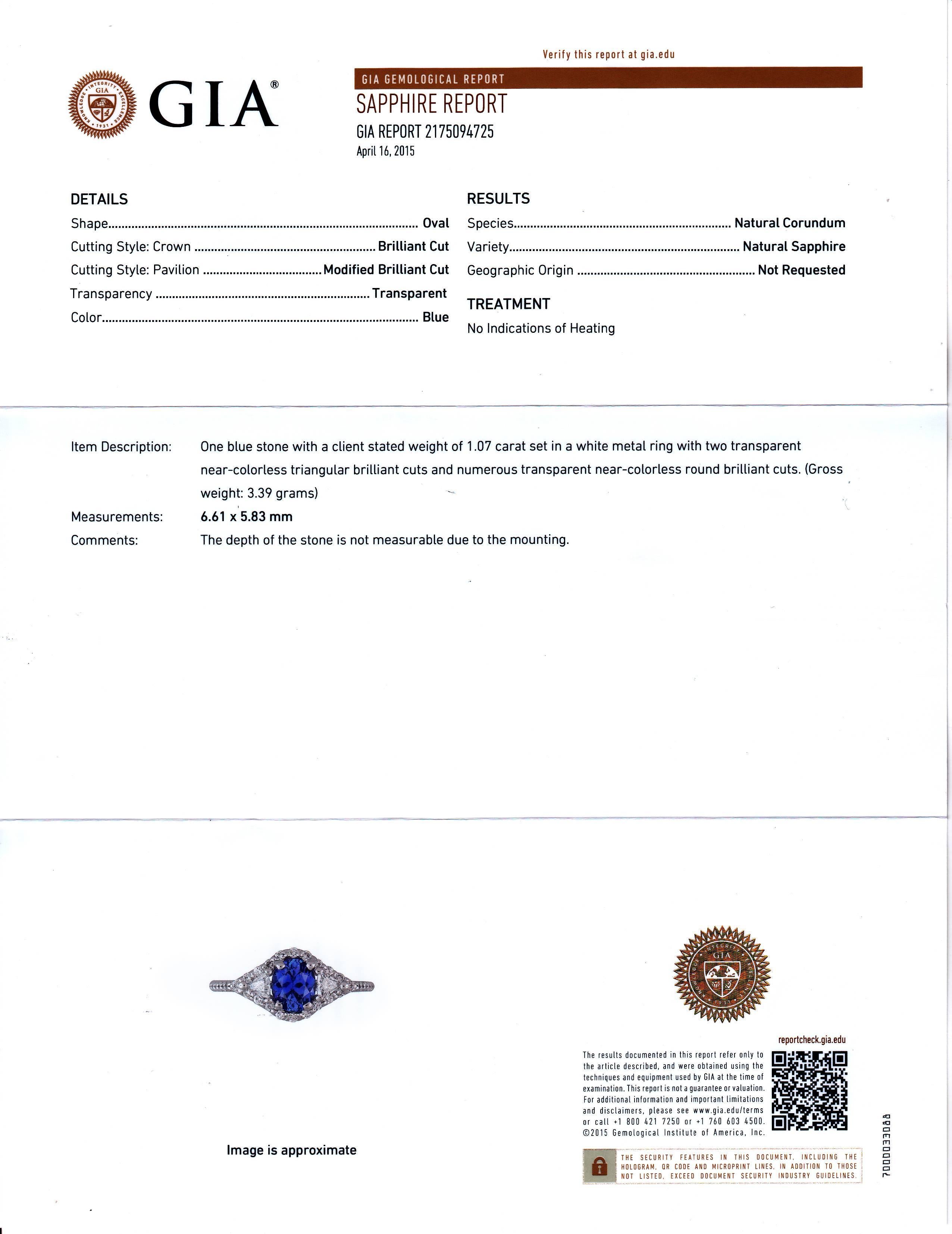 18 karat white gold GIA certified, one of a kind, cluster ring 
One carat and eight point Ceylon sapphire no indication of heat  
Two matched trillion diamonds side stones weighing 0.20 carat 
Surrounded by pave-set diamonds weighing 0.45 carats 