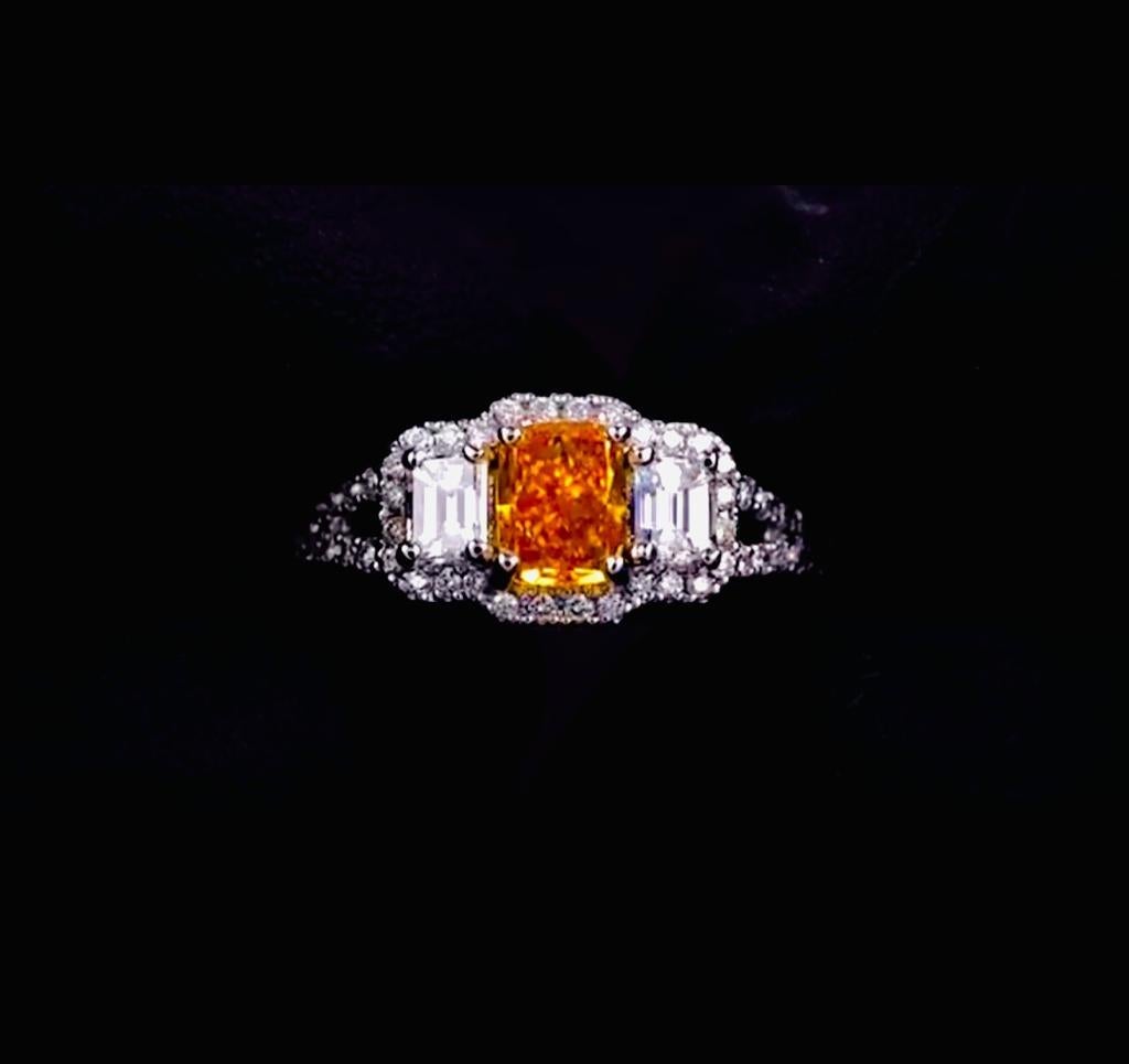 An exquisite investment grade Orange diamond with no other colors but Orange.
This incredible 3 stone ring from ISSAC NUSSBAUM NEW YORK features an incredibly rare Cushion cut pumpkin color diamond.
The incredible craftsmanship on this ring