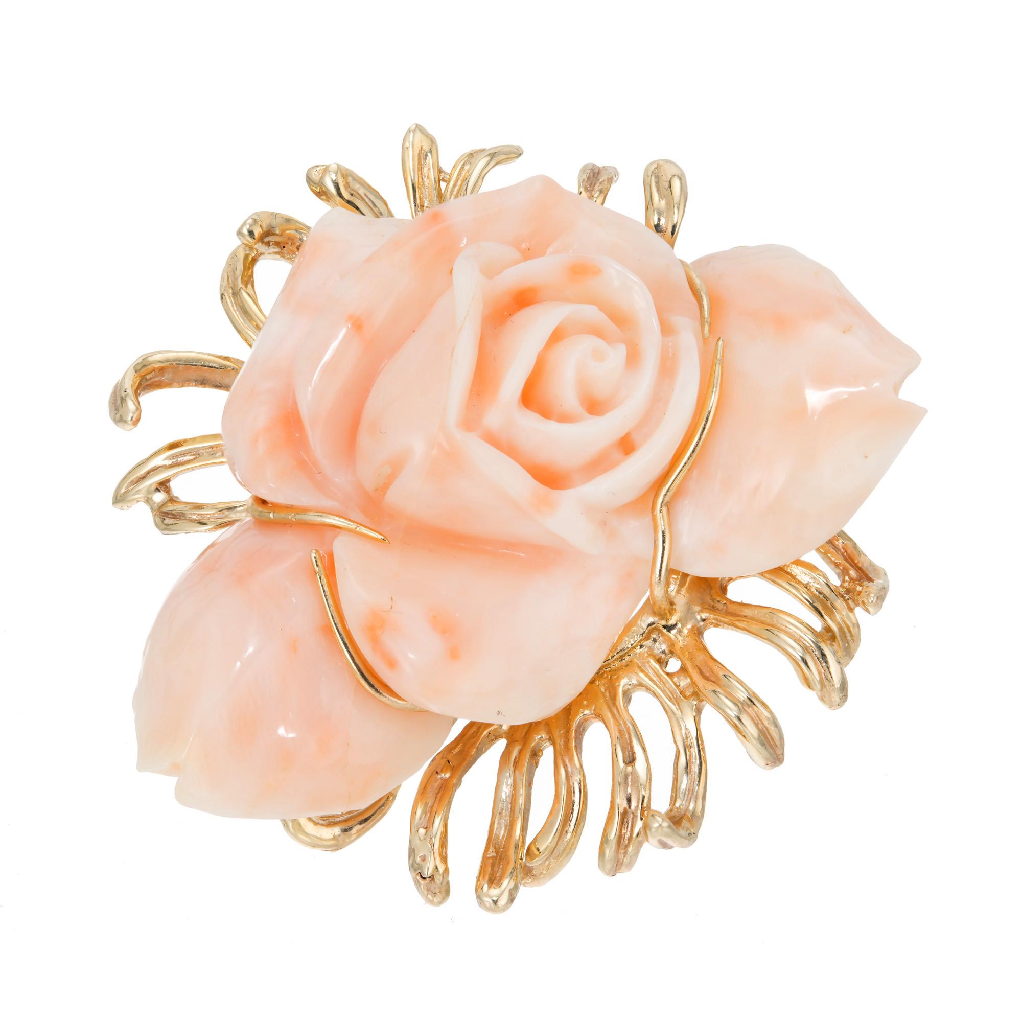 1960's mid-century natural GIA Certified carved floral brooch. One pink rose shaped carved coral set in a 14k yellow gold wire setting. GIA certified no indications of dye. 

Follow us on our 1stdibs storefront to view our weekly new additions and 5