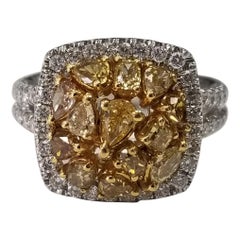 GIA Certified Orange-Yellow Fancy Intense with a Clarity of VS 18k Halo Ring