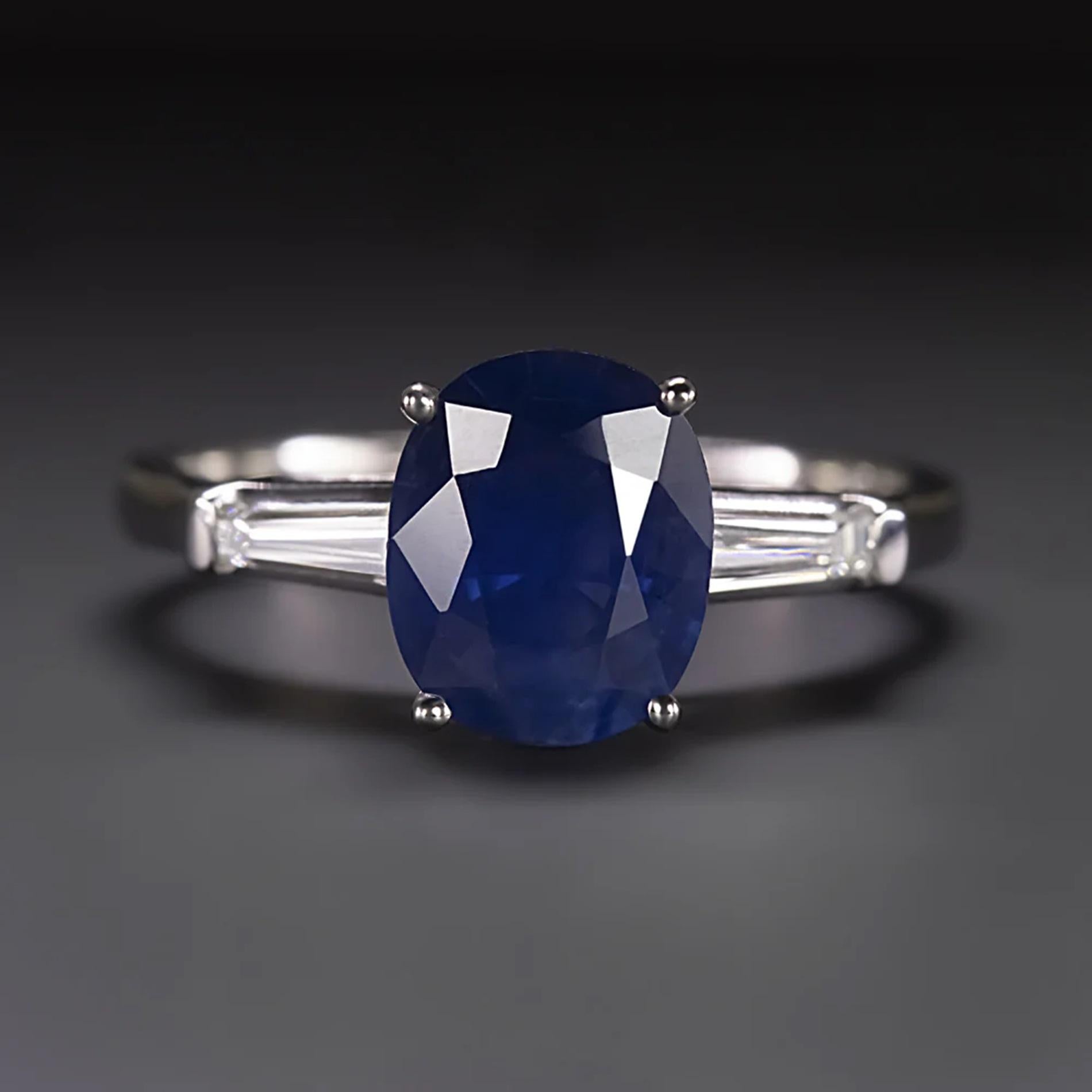 This classic ring features a bright blue sapphire in a timeless diamond accented platinum setting.

Highlights:

- 1.67ct natural sapphire with gorgeous rich blue color

- 0.16ct of bright white and exceptionally clean baguette cut diamonds

-