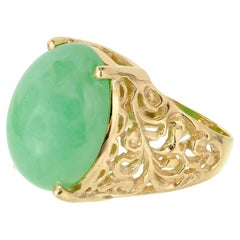 Anello cocktail in oro verde naturale con cabochon ovale di giada certificata GIA
