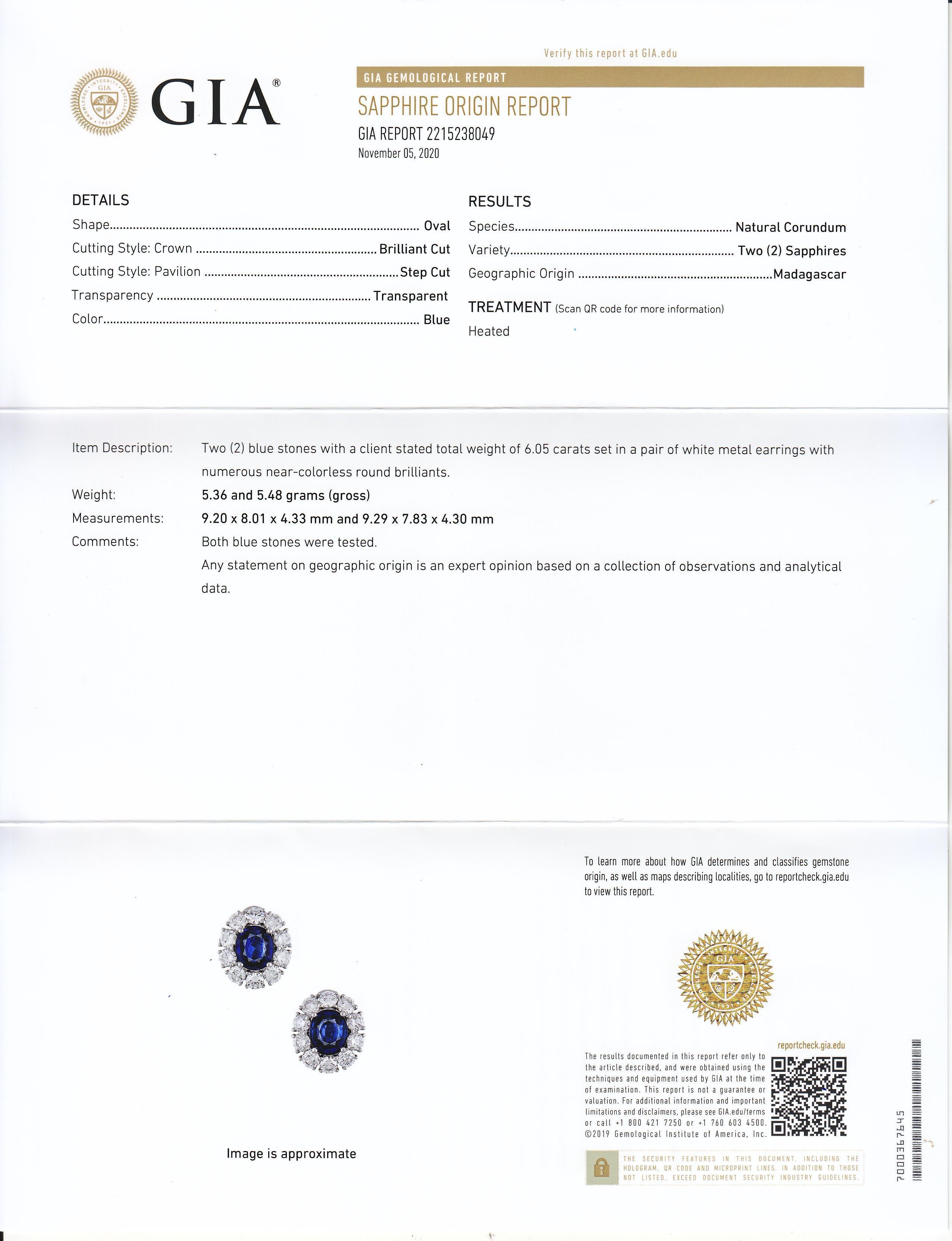 GIA Certified 6.05 Carats Oval Cut Blue Sapphire and Diamond Halo Clip Earrings For Sale 1