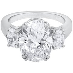 GIA Certified Oval Cut Diamond Three-Stone Engagement Ring