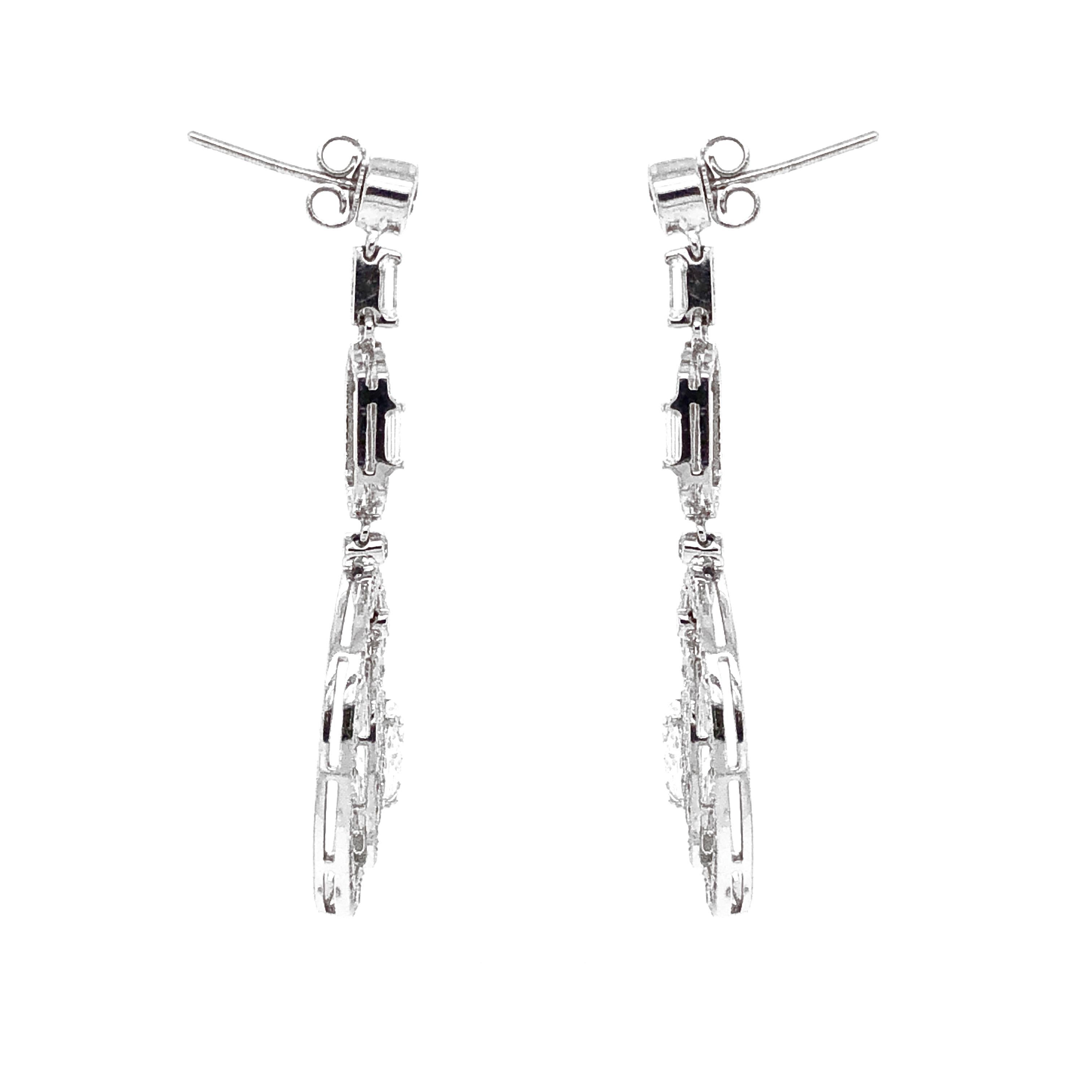 Contemporary GIA Certified Oval Cut Diamonds 2.02 Carat Dangling Platinum Earrings For Sale