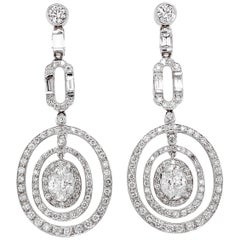 GIA Certified Oval Cut Diamonds 2.02 Carat Dangling Platinum Earrings