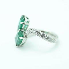 GIA Certified Oval Cut Emerald and Diamond Bypass Ring
