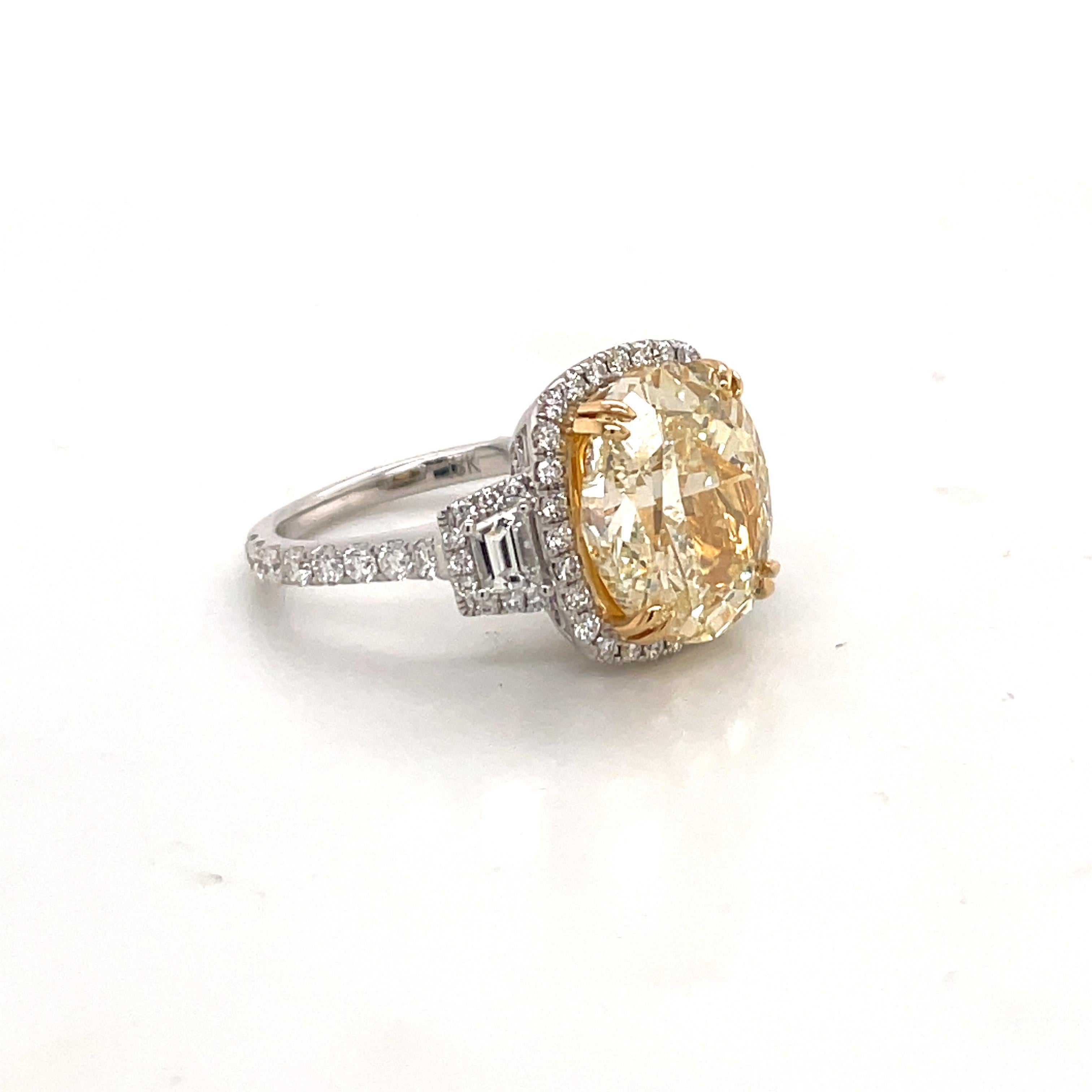 Contemporary GIA Certified Oval Cut Fancy Light Yellow Diamond Engagement Ring 7.16 Carats VS