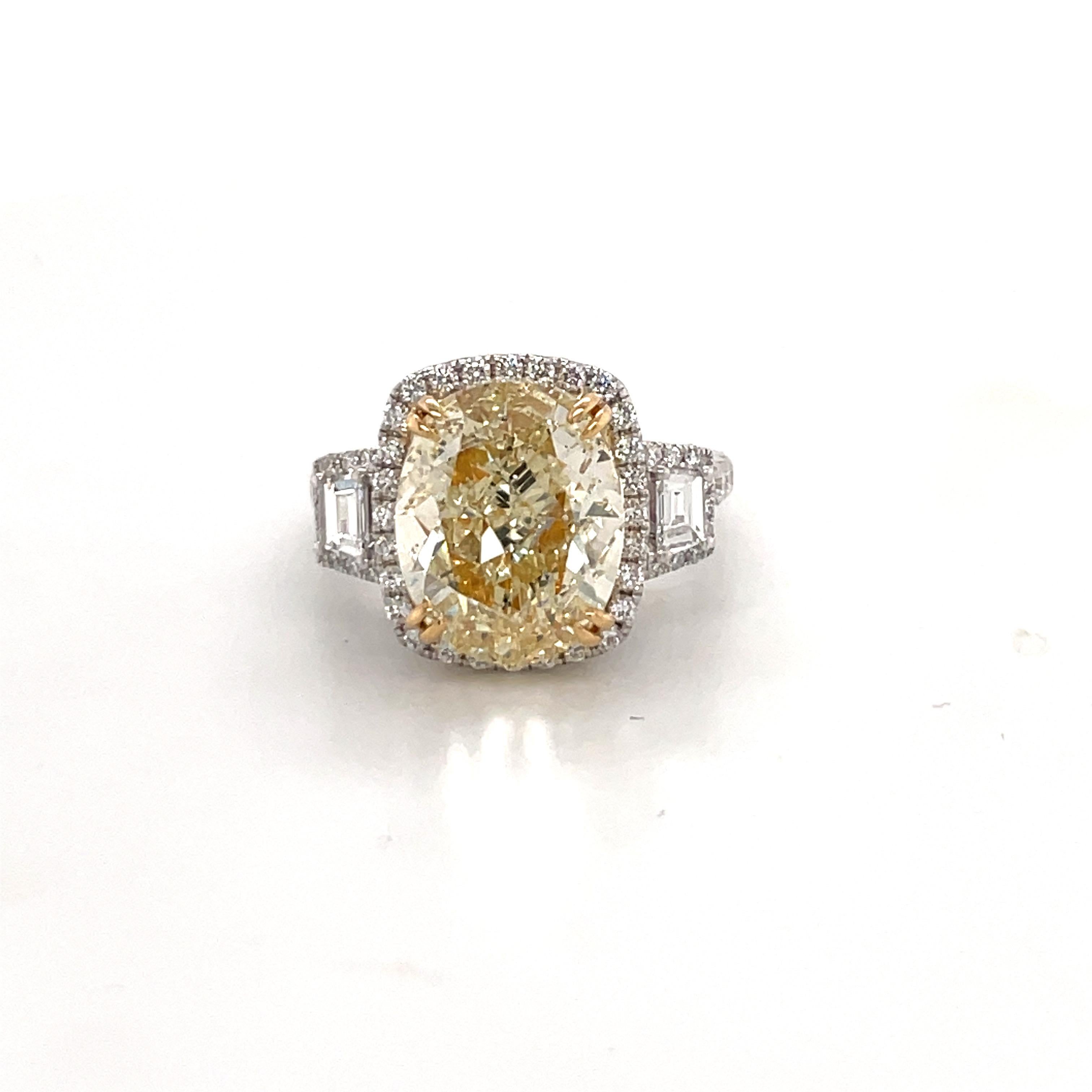 GIA Certified Oval Cut Fancy Light Yellow Diamond Engagement Ring 7.16 Carats VS In New Condition In New York, NY