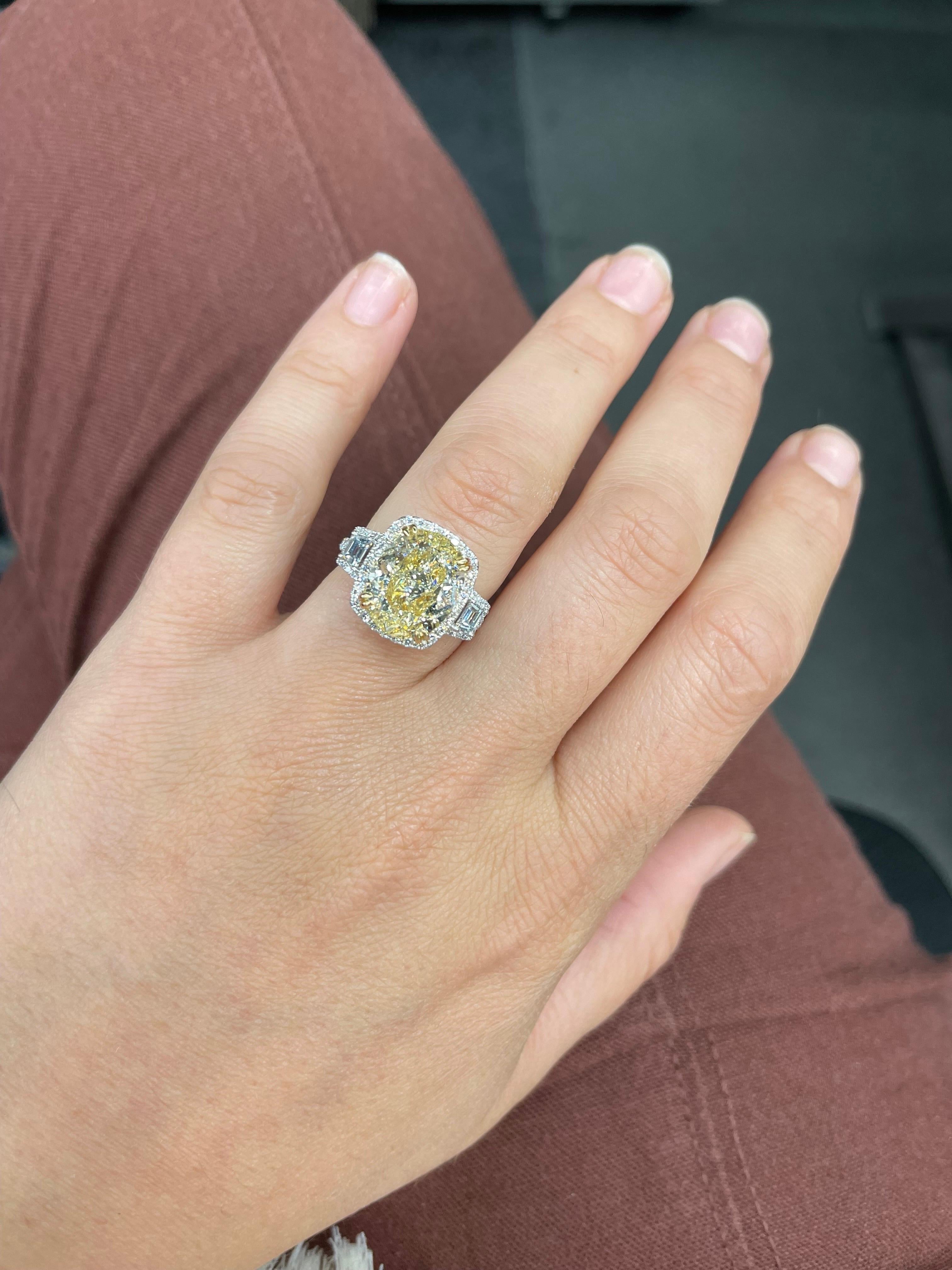 Women's GIA Certified Oval Cut Fancy Light Yellow Diamond Engagement Ring 7.16 Carats VS