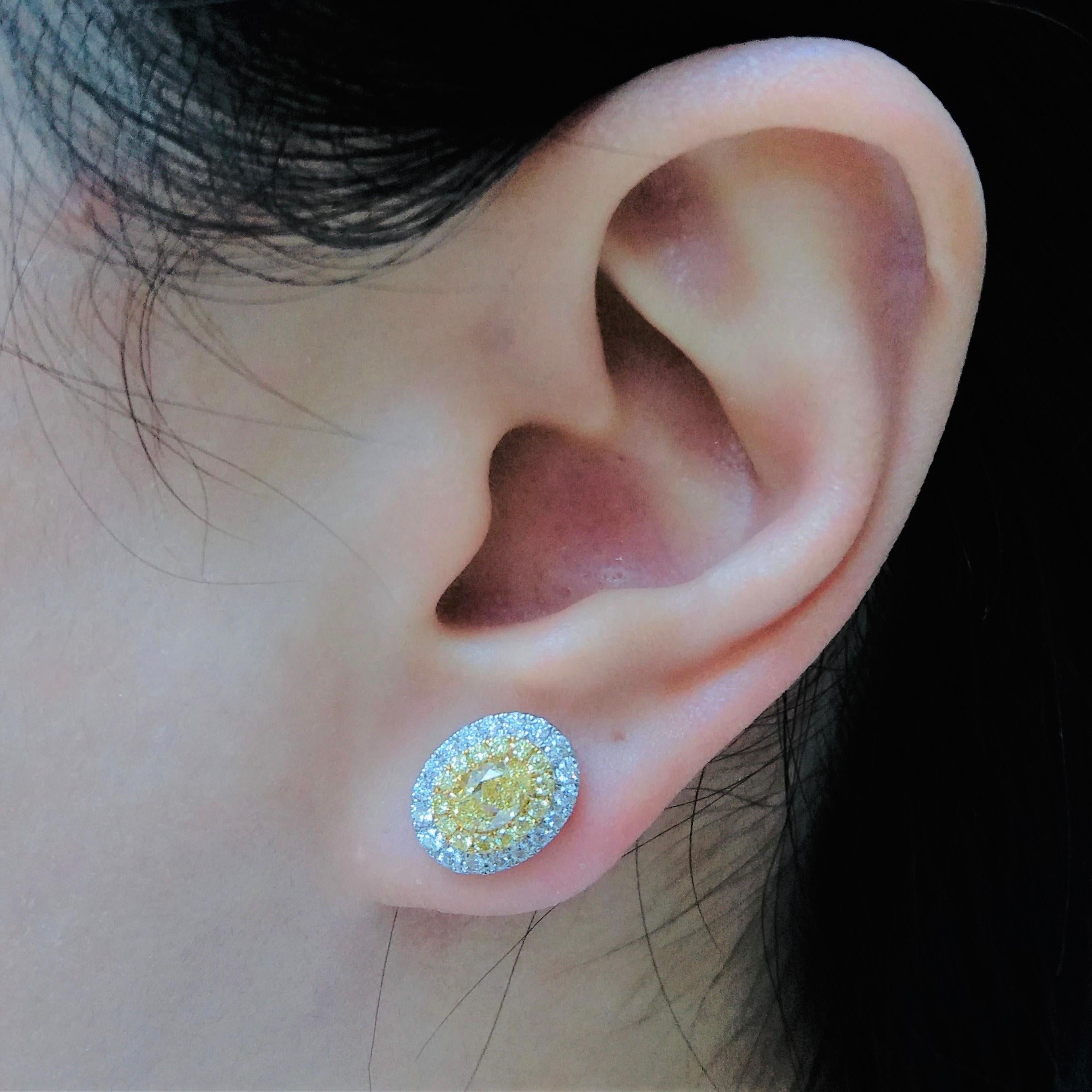 GIA Certified Oval Cut Natural Yellow Diamond and White Diamond Earrings In New Condition For Sale In Hong Kong, HK