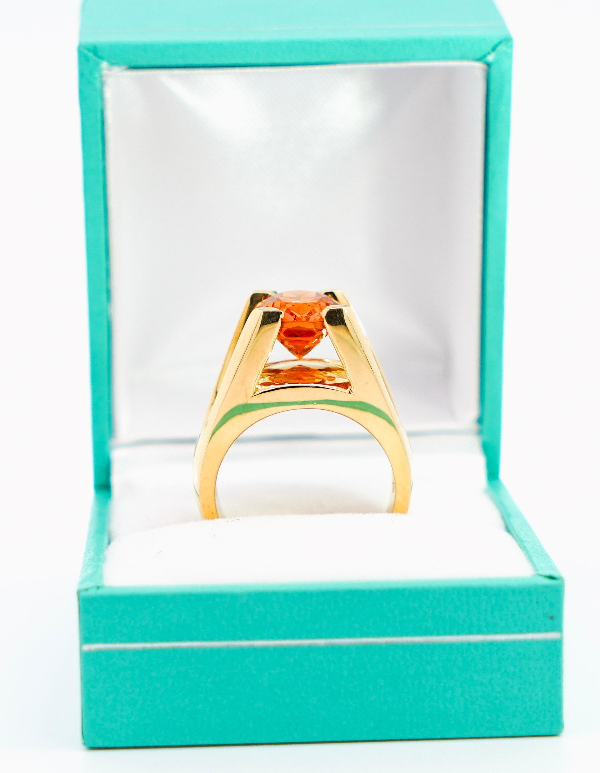 Women's GIA Certified Oval Cut Orange Spessartine Garnet And Diamond Ring For Sale