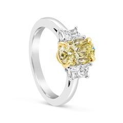 GIA Certified 1.57 Carats Oval Cut Yellow Diamond Three-Stone Engagement Ring