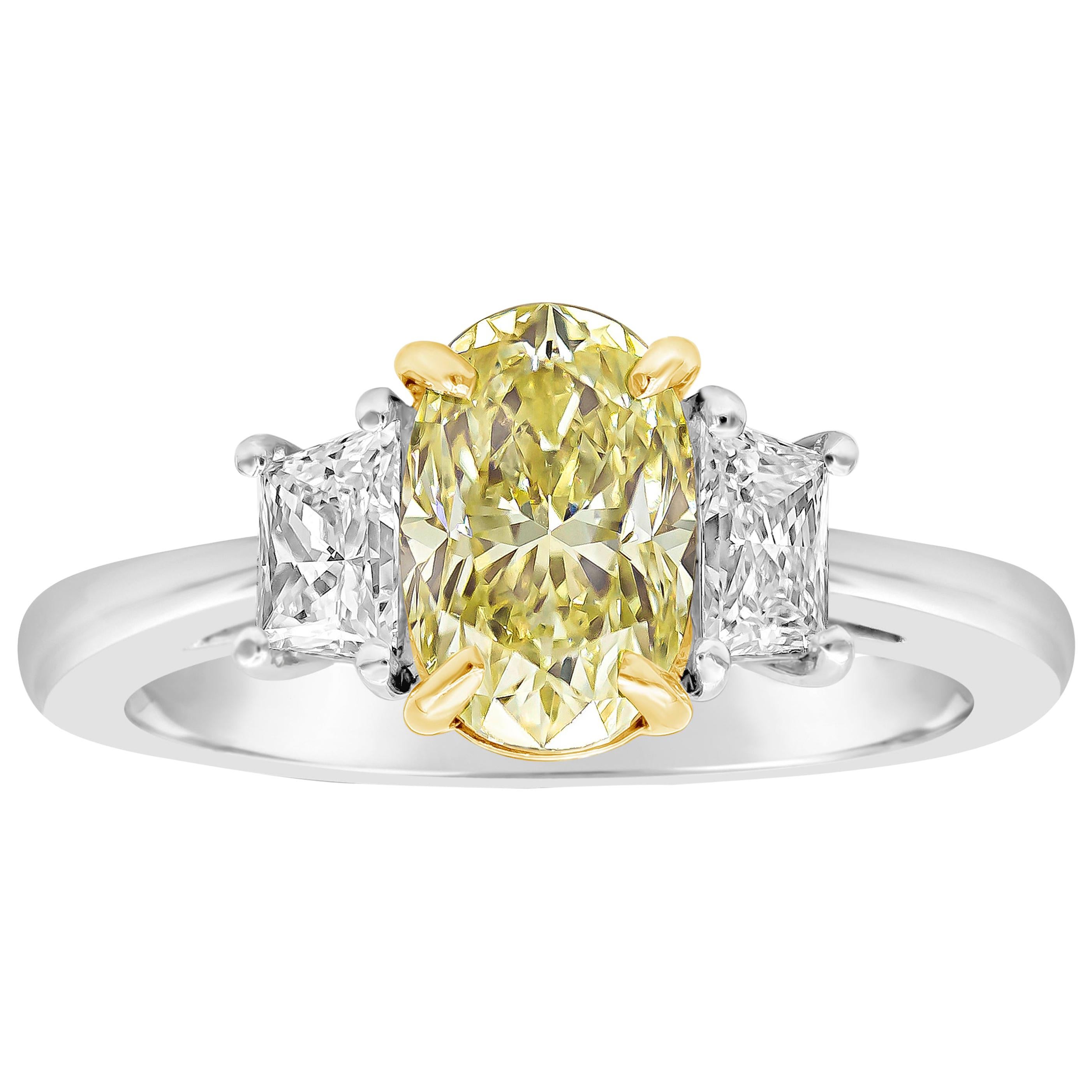 GIA Certified 1.57 Carats Oval Cut Yellow Diamond Three-Stone Engagement Ring For Sale
