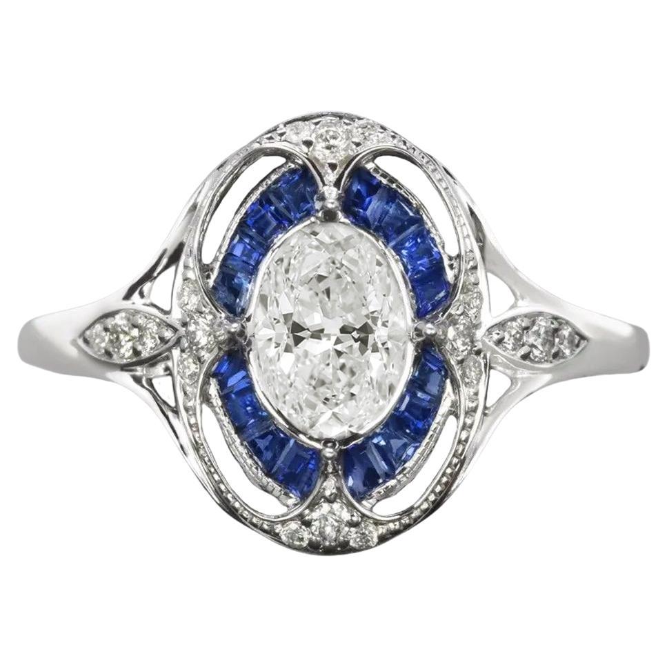 GIA Certified Oval Diamond Blue Sapphire Platinum Ring 