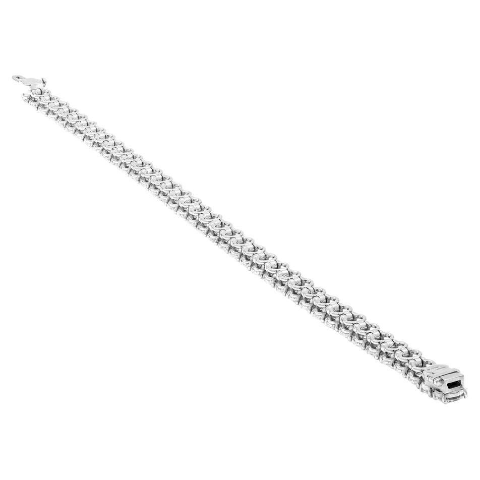 Bracelet en platine orné de diamants de taille ovale certifiés par le GIA
41 pierres : 0.30ct chacune
Poids total en carats : 12.34ct 
7'' de long
0.30 F VS1 GIA#2437012209 
0.30 E VS2 GIA#3405523644 
0.30 F VS1 GIA#6422984374
0.30 F VS2