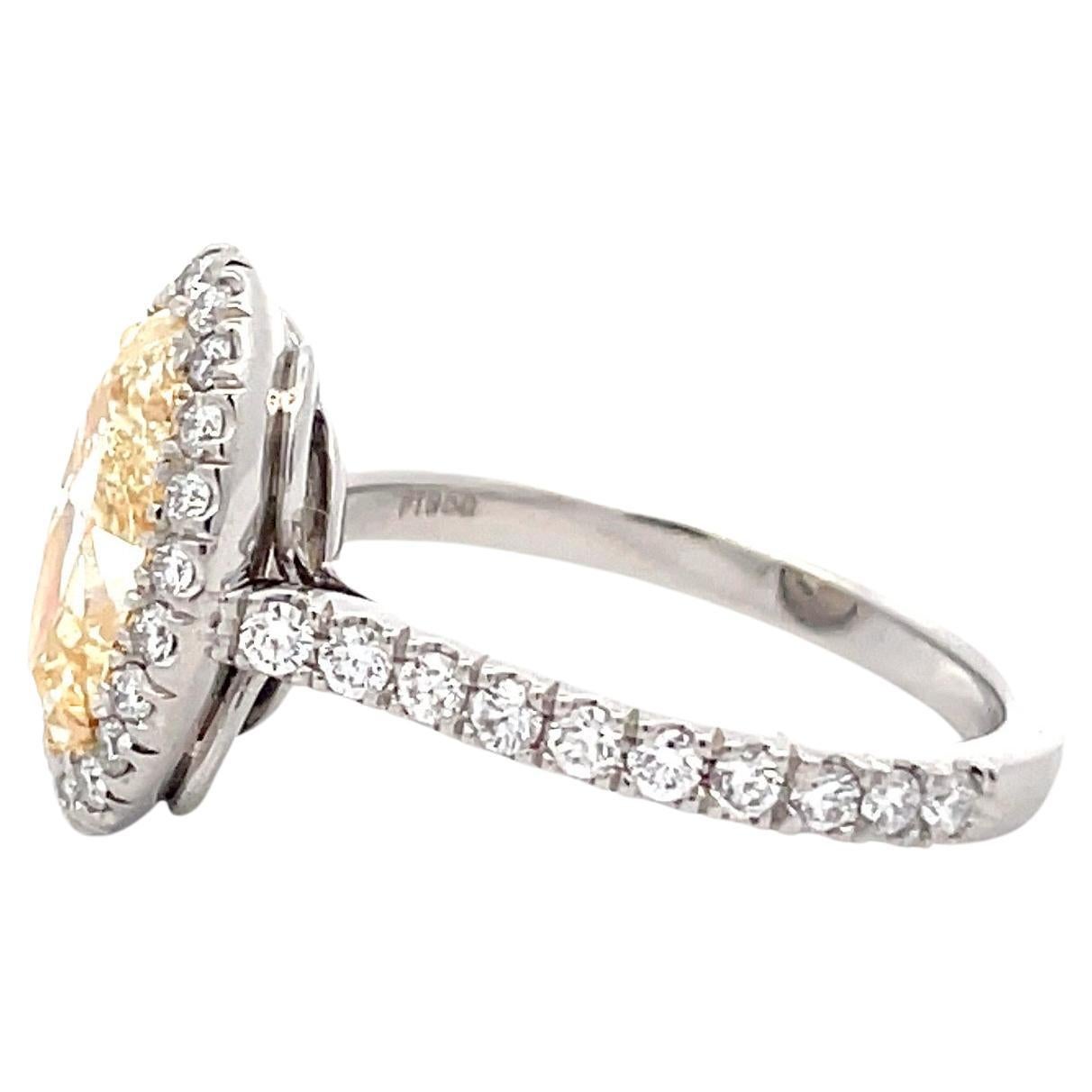 Contemporary GIA Certified Oval Diamond W-X VS1 Halo Engagement Ring 0.59 CTS D-E VS Platinum