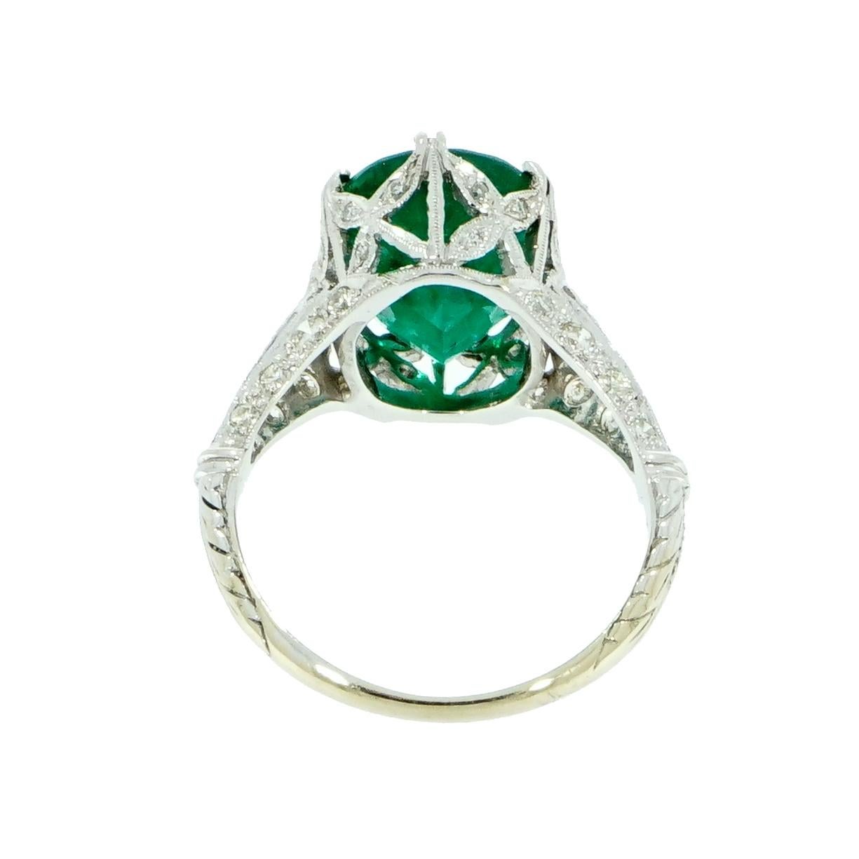 A Timeless Emerald ring… A fine example of Art Deco jewelry in its entire splendor! 
Ideal to be worn alone or as a lovely alternative Vintage Engagement Ring. 
A Family Heirloom Quality Keepsake, to have and to hold Forever! 
The oval Emerald is