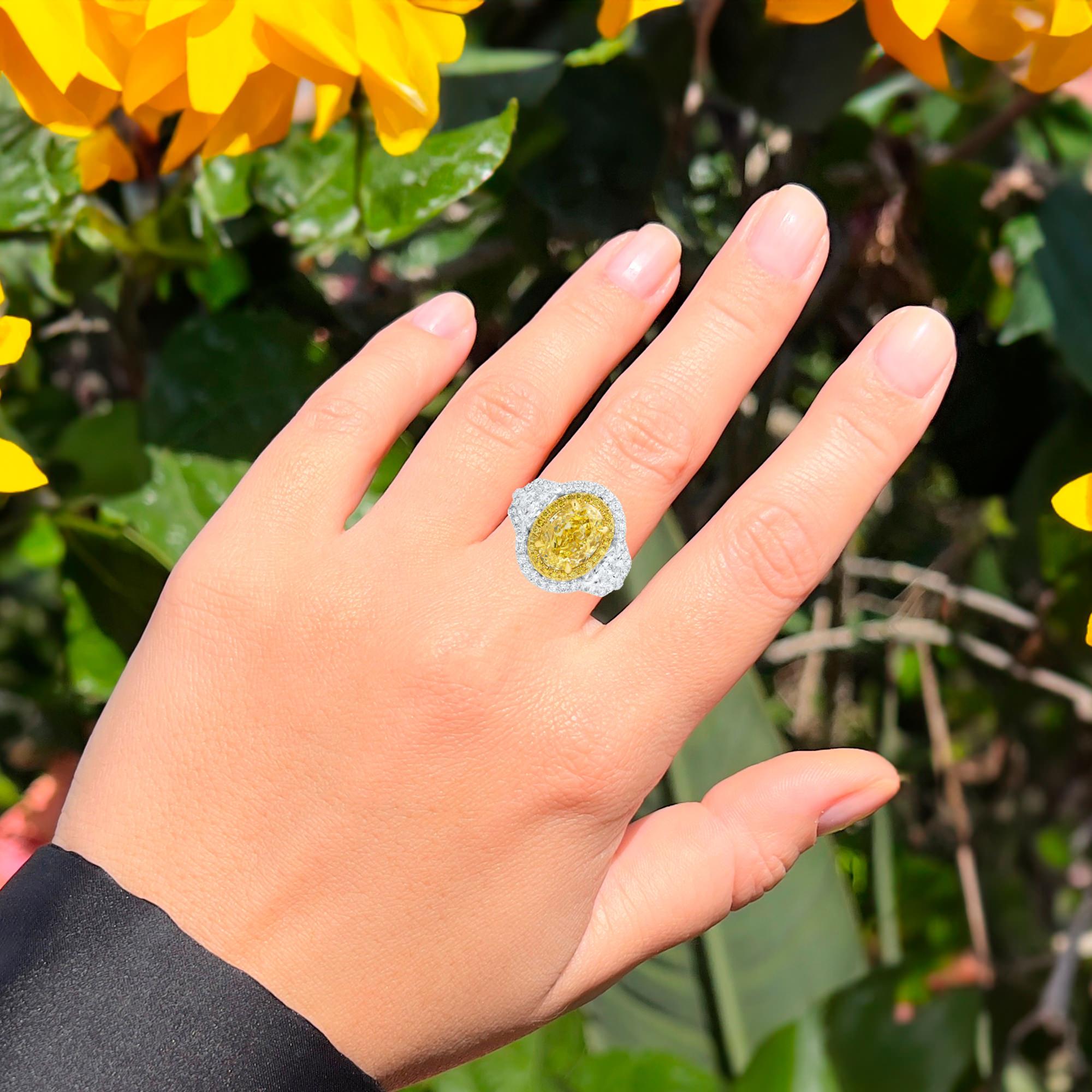 Contemporary GIA Certified Oval Fancy Yellow Diamond Ring 4.8 Carats Total 18K Gold For Sale