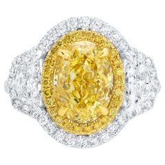 GIA Certified Oval Fancy Yellow Diamond Ring 4.8 Carats Total 18K Gold