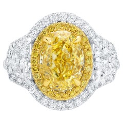 GIA Certified Oval Fancy Yellow Diamond Ring 4.8 Carats Total 18K Gold