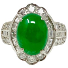Anello con cabochon ovale di giada e diamante bianco certificato GIA in platino