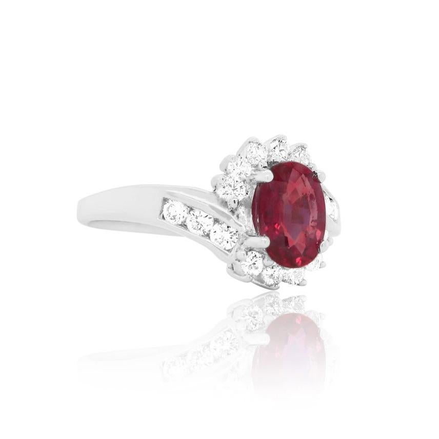 Material: 18K White Gold
Center Stone Details: 1 Oval GIA Certified Ruby at 1.18 Carats
GIA Certificate Can Be Seen In Photos
Side Stone Details: White Diamonds at 0.40 Carats Total Weight

Fine one-of-a-kind craftsmanship meets incredible quality