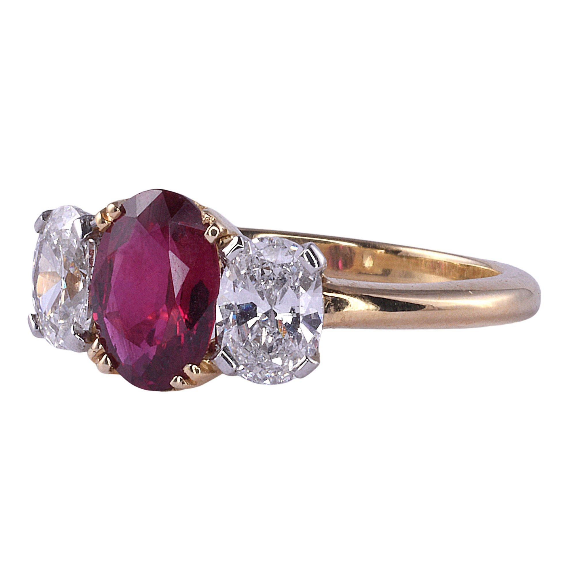 Estate GIA certified oval ruby & oval diamond 18K ring. This estate ring is crafted in 18 karat yellow gold and platinum featuring a GIA certified 1 carat ruby. The ruby has very fine color and has been heat treat as with most on the market. It is