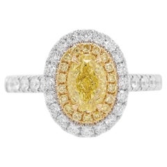 Bague en or 18 carats certifiée par le GIA, de forme ovale, avec diamant jaune fantaisie et diamant blanc