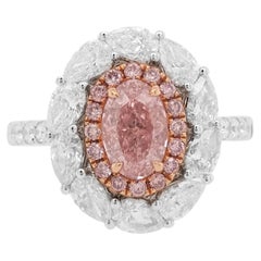 Anello in oro 18 carati con diamante rosa a forma ovale e diamante bianco a forma di pera certificato GIA