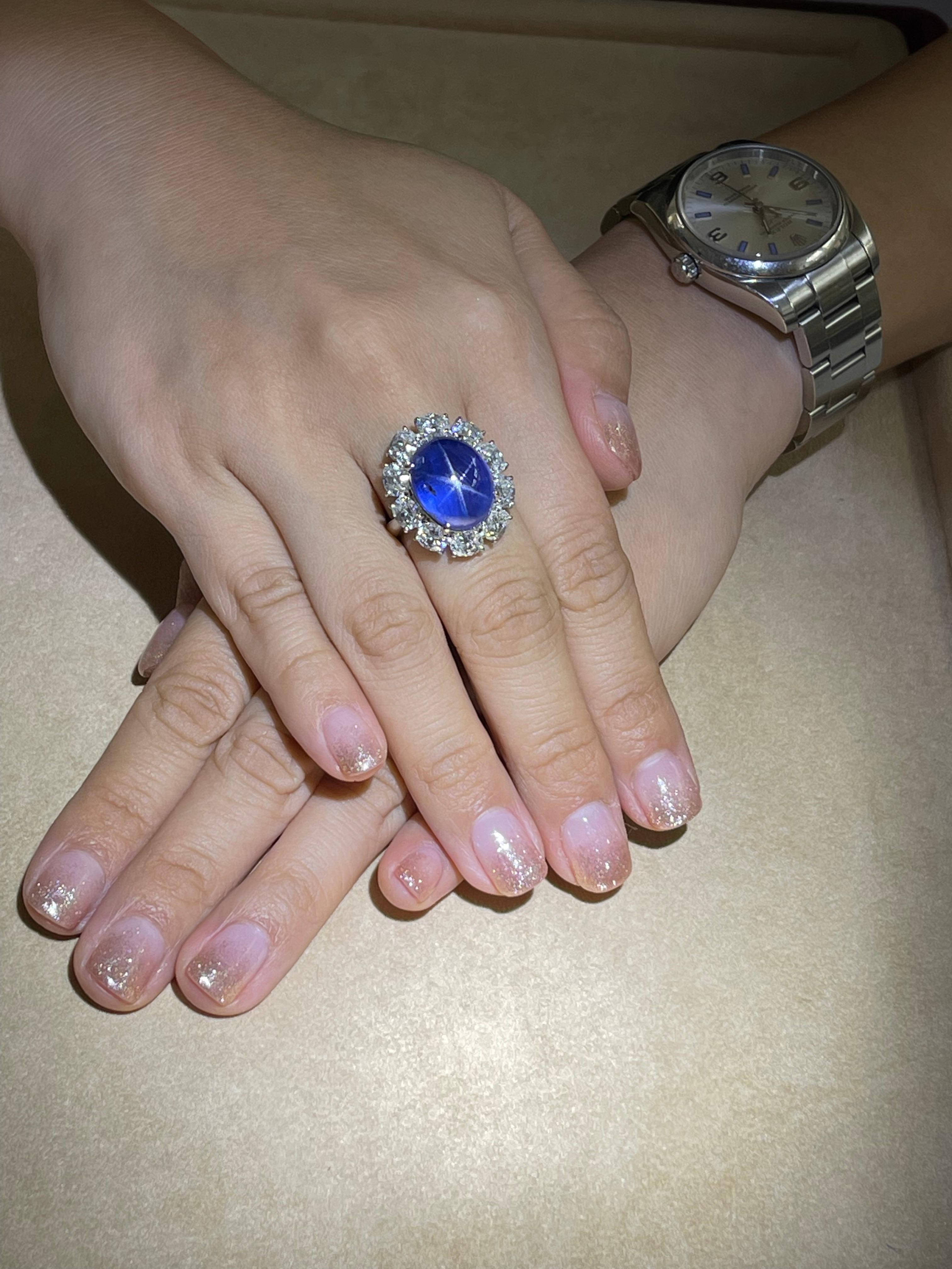 Please check out the HD Video. Here is a superb oversized natural star Sapphire and diamond ring. The ring is set in platinum and diamonds. There are 10 oval diamonds totaling 3.54 Cts. Each diamond is around 0.35cts each!  The star sapphire is